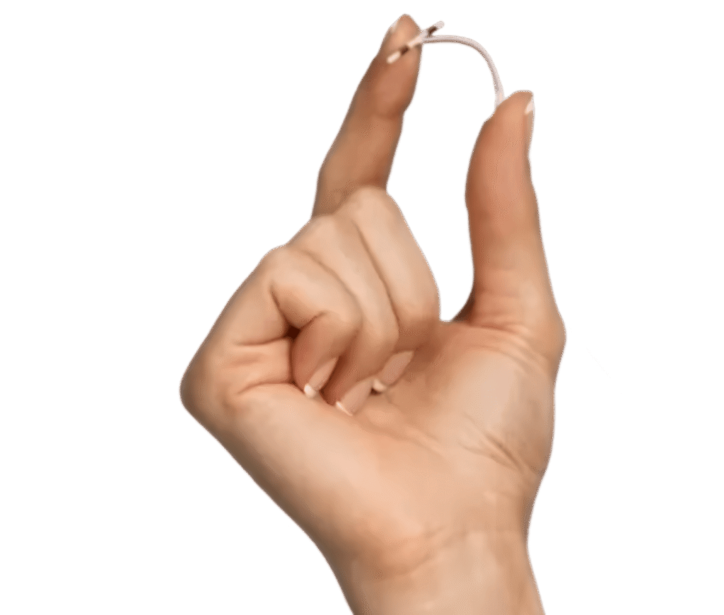 Hand holding the Paragard IUD showing how flexible it is